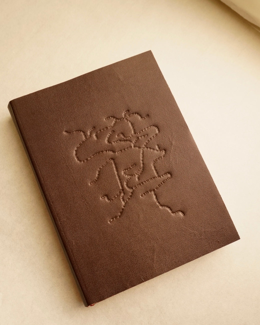 RELIURE Á CRU | limp leather binding with blind tooling | A5
